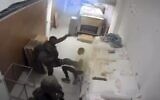 An IDF soldier kicks a Palestinian in the West Bank town of Dura in October 2025. (Screen capture/X)